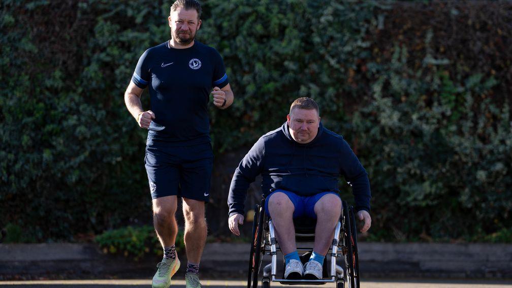 Wayne Burton in training with his Oaksey House physiotherapist Scott Reed as the pair prepare for the 2024 London Marathon

