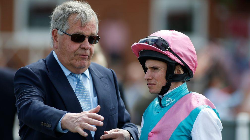 NEWBURY, ENGLAND - MAY 20: Sir Michael Stoute (L) with Ryan Moore at Newbury racecourse on May 20, 2017 in Newbury, England. (Photo by Alan Crowhurst (Getty Images)