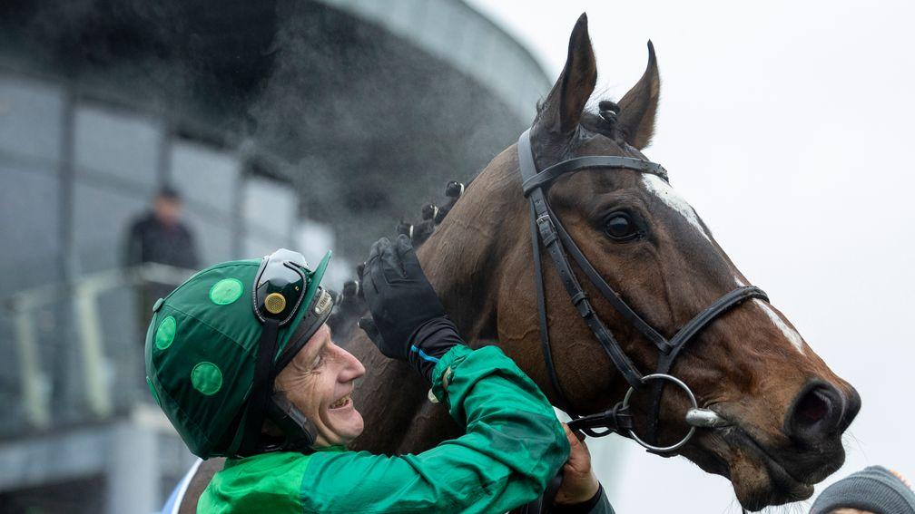 Daryl Jacob gives a pat to Grade 1 winner Readin Tommy Wrong
