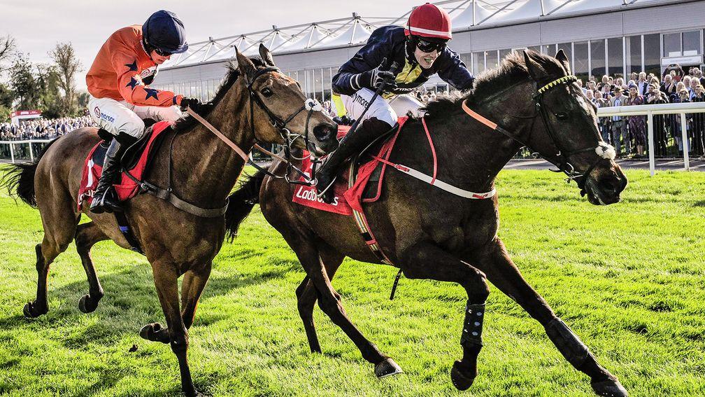 Fastorslow: surges to the front past Bravemansgame in last year's Punchestown Gold Cup