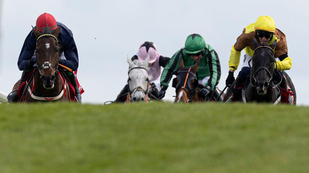 Fastorslow and JJ Slevin (left) are too good for Galopin Des Champs and the rest in the Punchestown Gold Cup
