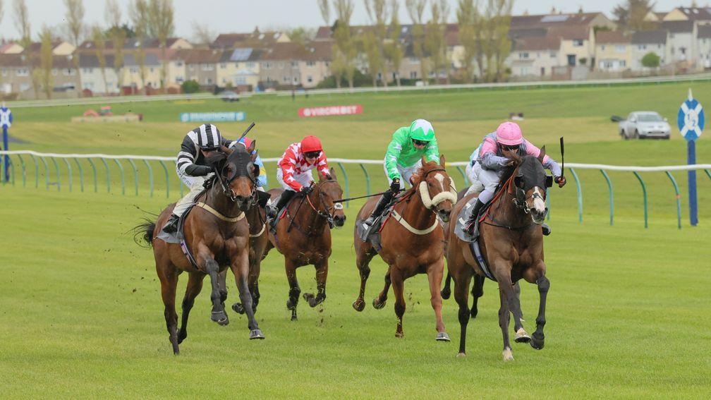 Catherine Chroi (pink hat): won for the third time in five starts since rejoining the yard