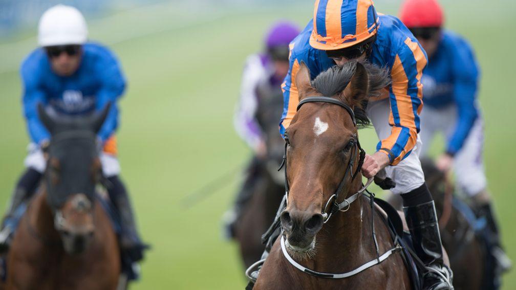 Churchill (Ryan Moore, right) leads them home in the Guineas
