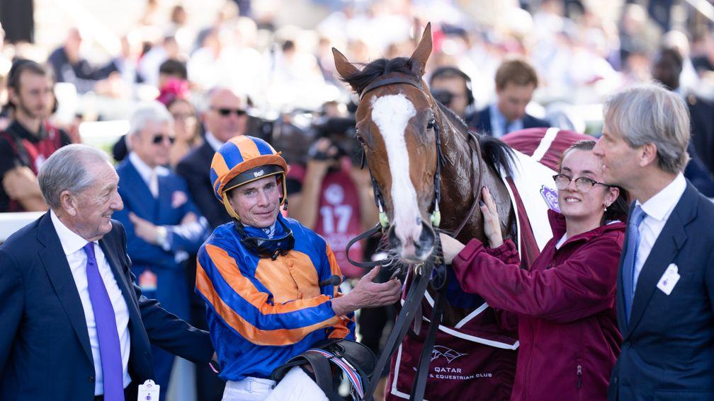 Opera Singer in the winner's enclosure with Ryan Moore and part-owner Derrick Smith (left)