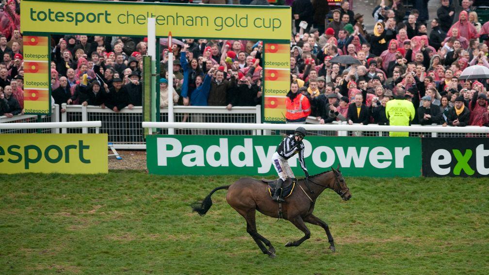 Imperial Commander and Paddy Brennan soak up the applause as they win the 2010 Gold Cup at Cheltenham but it was a different story the following month at Aintree