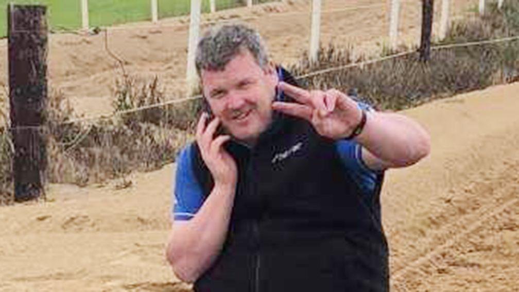 Gordon Elliott poses in the picture that has united the sport in condemnation. The Racing Post has decided not to publish the bottom half of the photo