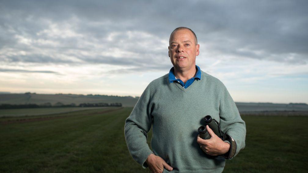 Clive Cox enjoys the early morning at his 'office' on the Lambourn Downs