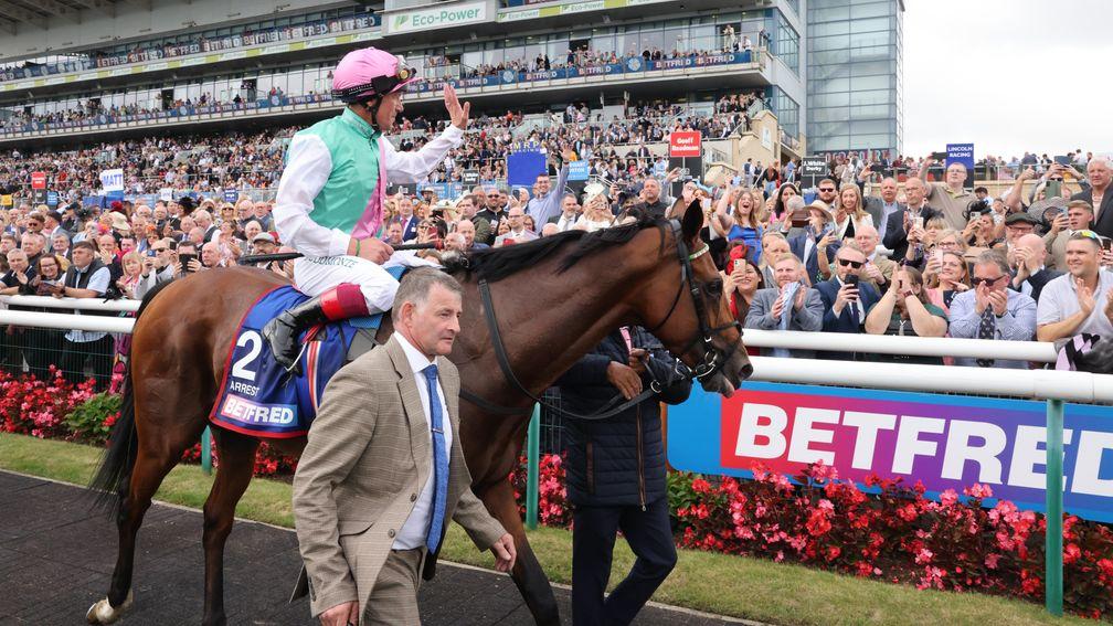 Frankie Dettori waves goodbye to the Doncaster crowd after the Betfred St Leger 