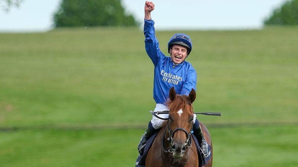 William Buick celebrates after riding Notable Speech to win the Qipco 2,000 Guineas Stakes at Newmarket