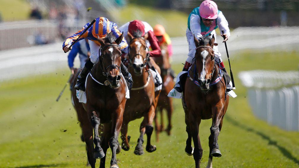 CHESTER, ENGLAND - MAY 04: Ryan Moore riding Somehow (L) win The Arkle Finance Cheshire Oaks from Moorside (R) at Chester racecourse on May 4, 2016 in Chester, England. (Photo by Alan Crowhurst/Getty Images)