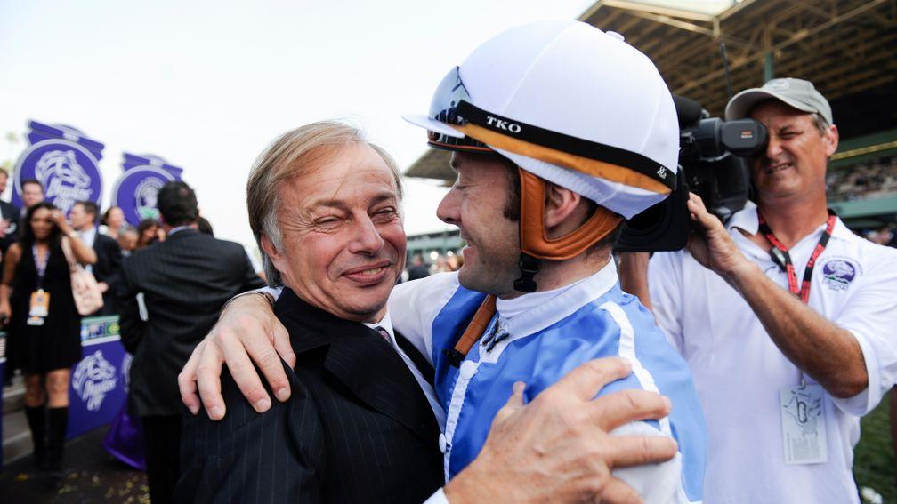 Freddy Head and Olivier Peslier celebrate after Goldikova's win in the 2009 Breeders' Cup Mile