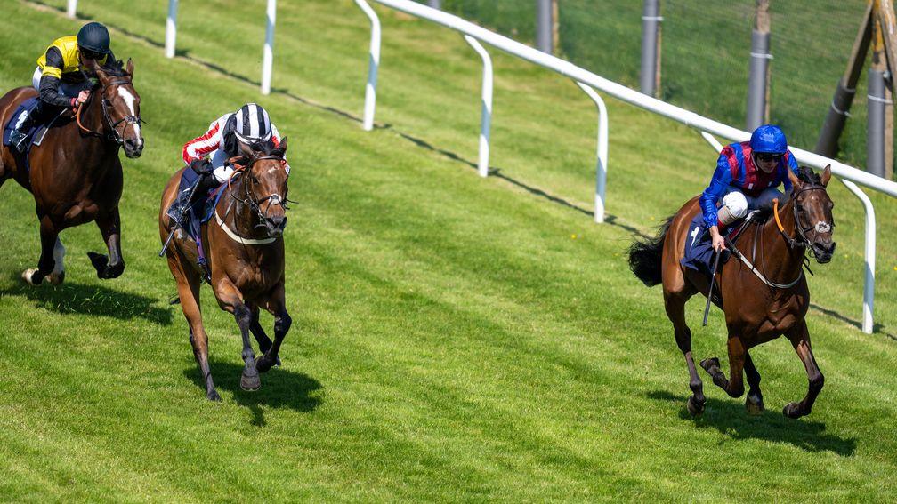 Confils (right) completes a double for Andrea Atzeni at Brighton on Tuesday