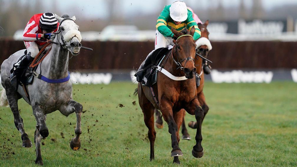 Champ (green) surges clear to the land Grade 1 Betway Challow Novices' Hurdle