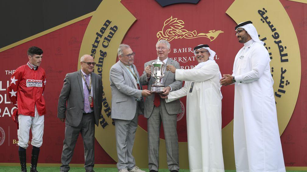 Joy for Sir Alex Ferguson as he collects the Bahrain Trophy with fellow owner Ged Mason alongside trainer Richard Fahey and jockey Oisin Orr
