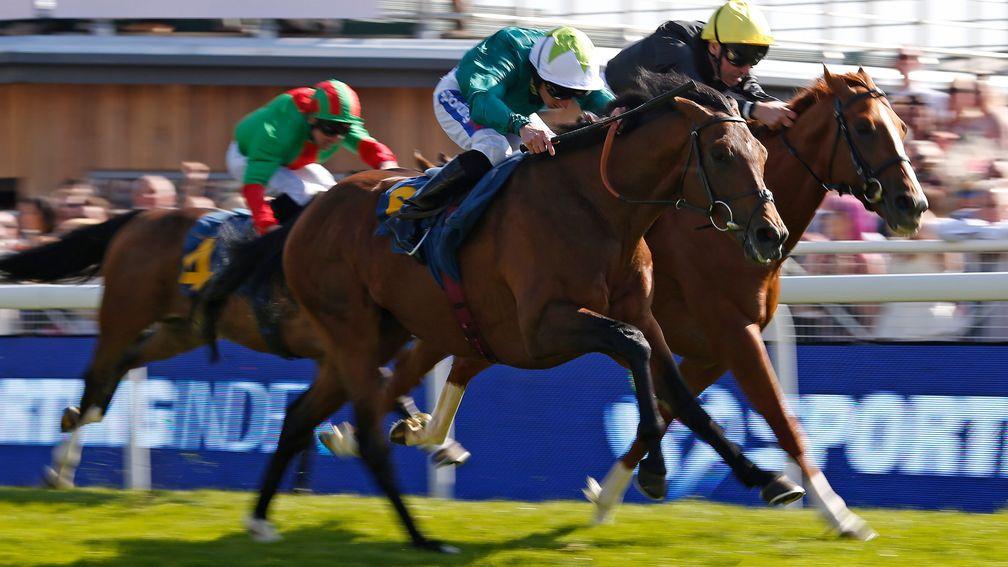 CHESTER, ENGLAND - MAY 10:  Paul Hanagan riding Here And Now (green) win The Sporting Index Handicap Stakes at Chester Racecourse on May 10, 2017 in Chester, England. (Photo by Alan Crowhurst/Getty Images)