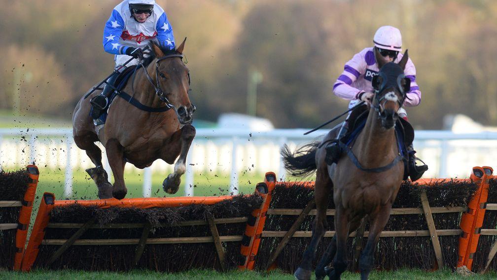 Reve De Sivola and Daryl Jacob (left) jump the last before giving winning chase to Zarkandar in the 2014 Long Walk Hurdle at Ascot