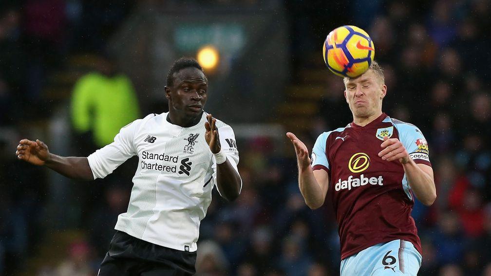 Defender Ben Mee (right) has been a rock for overachieving Burnley this season