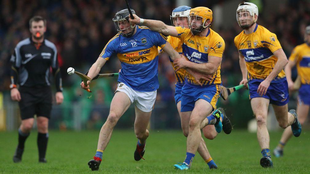 Tipperary's Colin English (left) and James McCarthy of Clare
