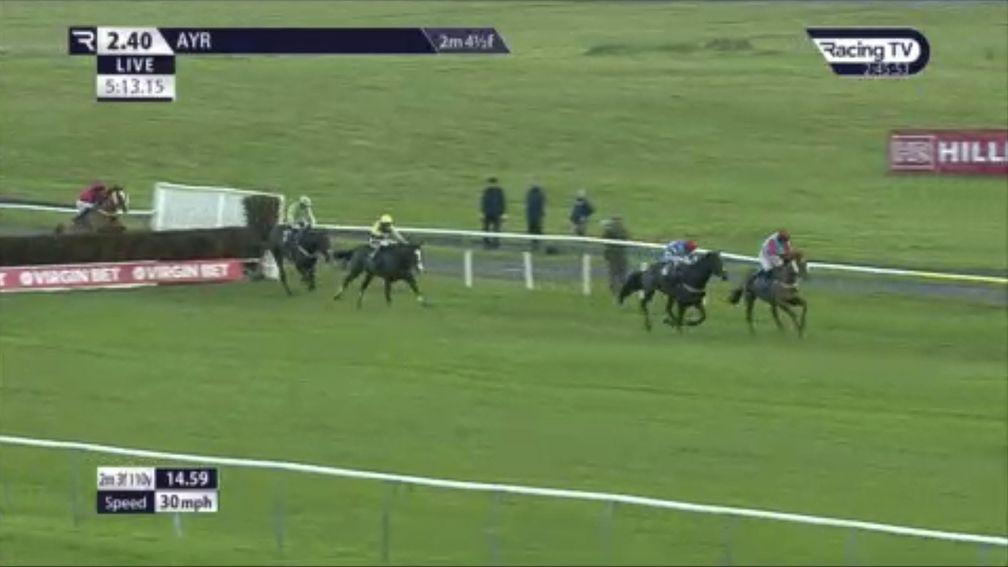 20-1 shot Ardera Cross leads Lisloran over the last in the 2m4½f handicap chase at Ayr