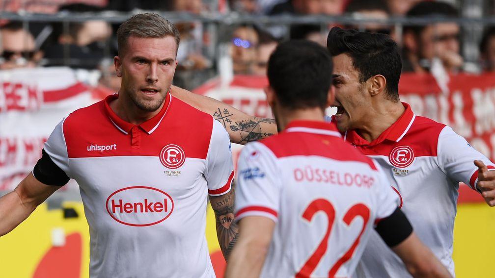 Andre Hoffmann of Fortuna Dusseldorf celebrates after scoring against SC Freiburg