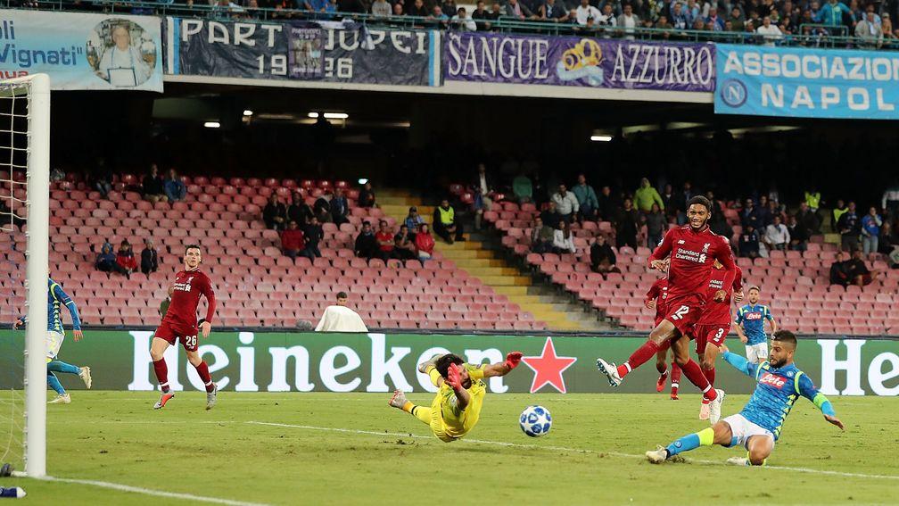Napoli's Lorenzo Insigne scores against Liverpool at Stadio San Paolo