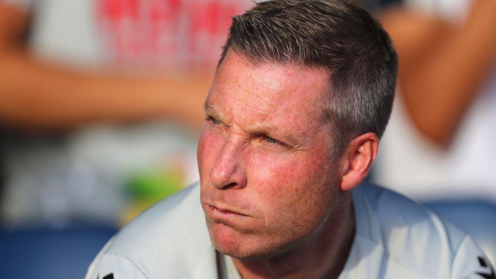 Gillingham boss Neil Harris has taken his team to the top of League Two
