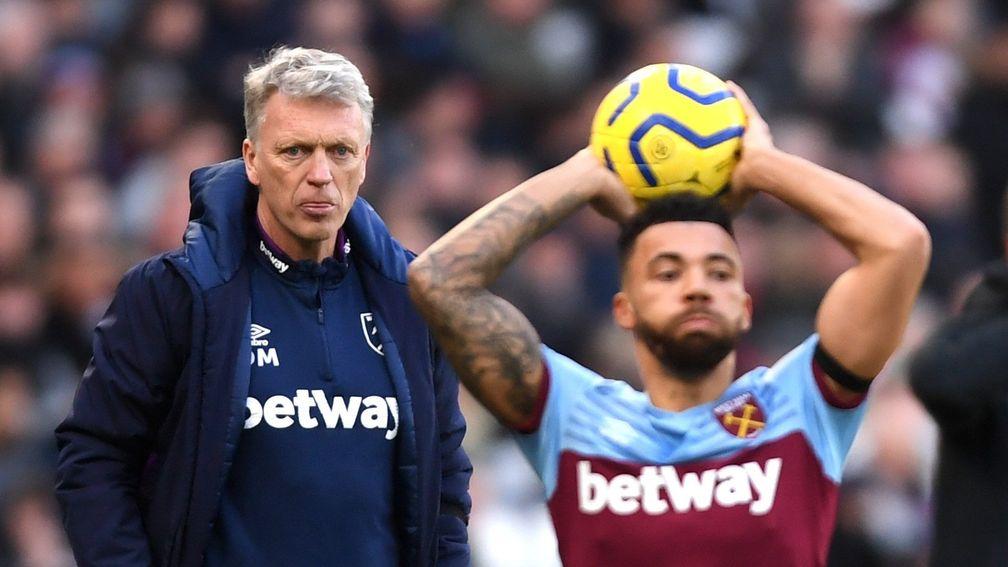 West Ham manager David Moyes looks on as Ryan Fredericks takes a throw in