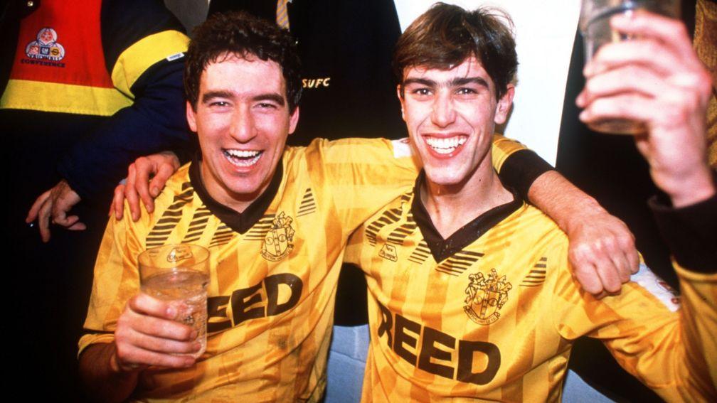 Sutton United's Tony Rains and Matthew Hanlan celebrate after their 1989 FA Cup victory over Coventry City at Gander Green Lane