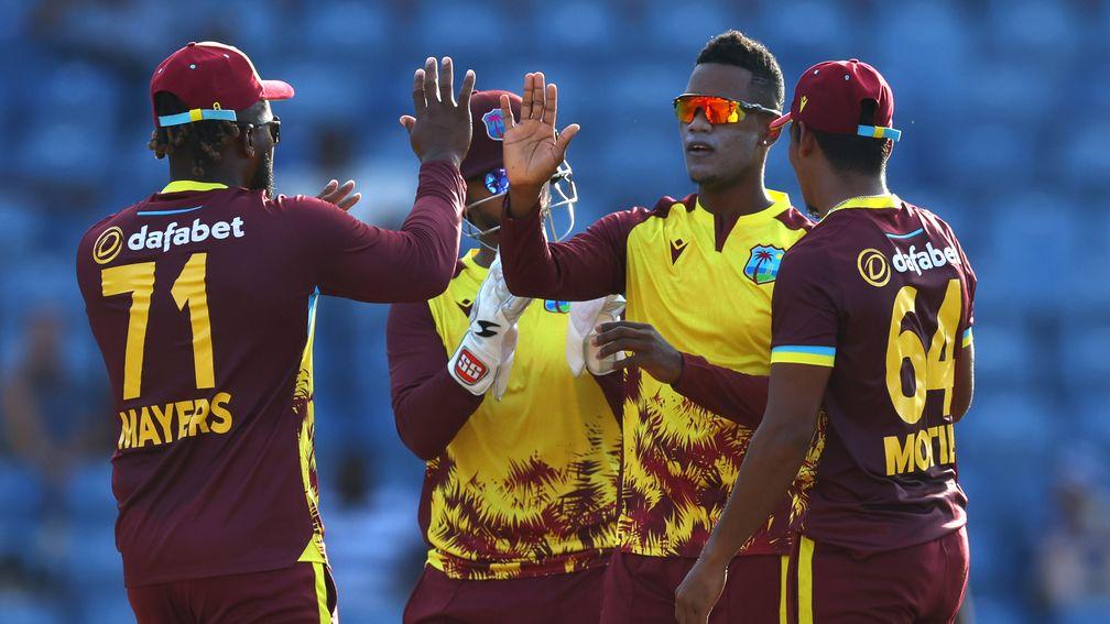 Akeal Hosein celebrates a wicket in the second T20 against England