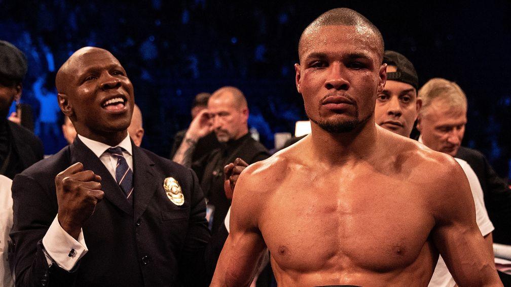 Chris Eubank Jr celebrates victory over James DeGale with his dad