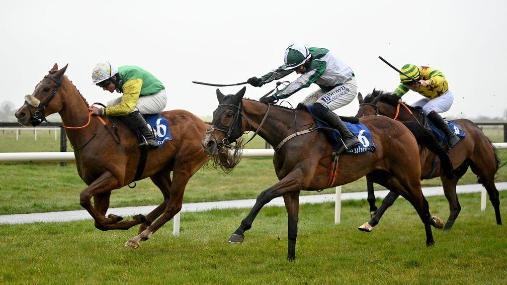 Implicit (centre) hunts down Ossie's Lodge at Fairyhouse