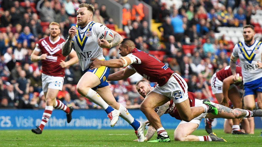 Warrington's Blake Austin scores a try during against Wigan