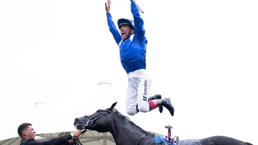 Frankie Dettori performs his trademark flying dismount after his Juddmonte success