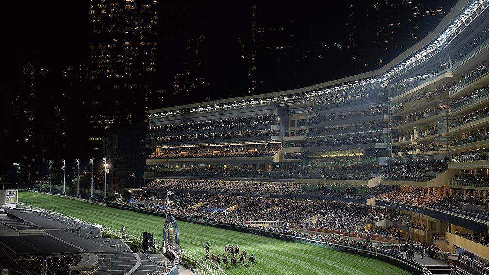 A spectacular view of Happy Valley as Rachel King makes a dream debut with victory on Oversubscribed (centre) in the first leg of the International Jockeys' Championship