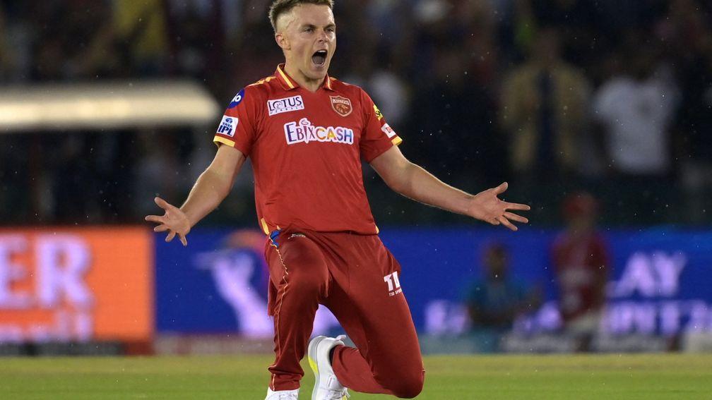 Punjab Kings' Sam Curran celebrate after the dismissal of Kolkata Knight Riders' Andre Russell