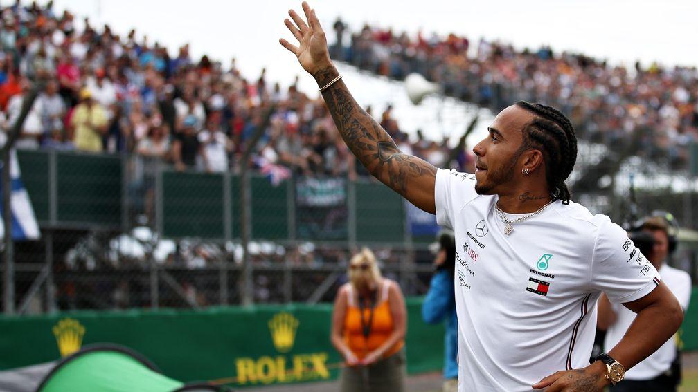 Lewis Hamilton waves to the Silverstone crowd