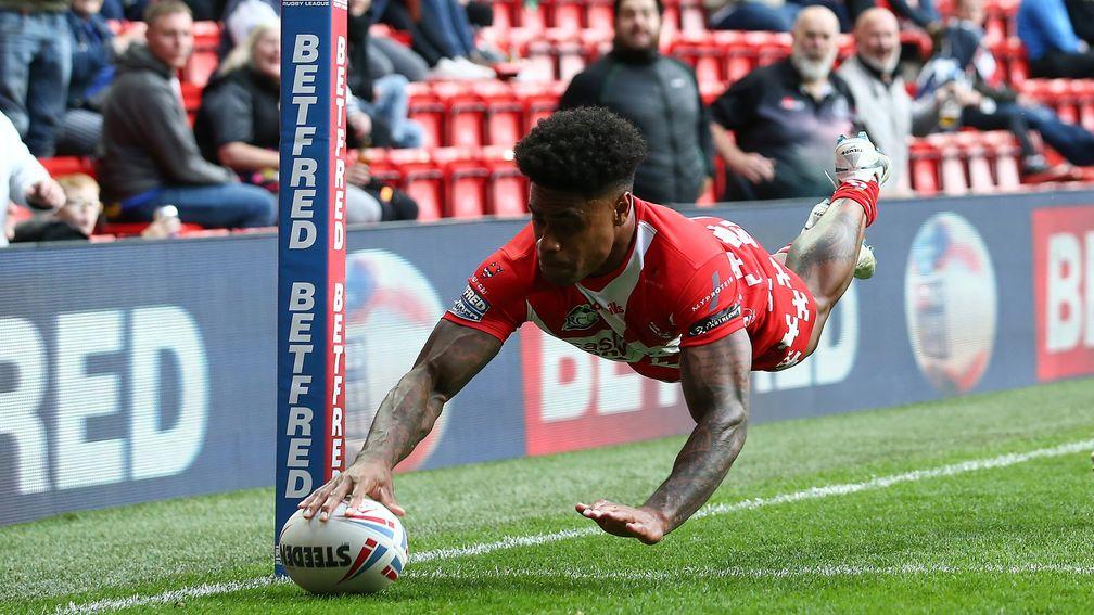 Kevin Naiqama dives over for a St Helens try
