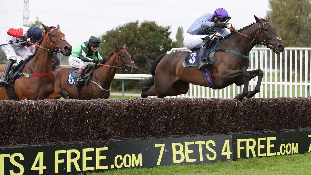 Discay and Adam Nicol fly the last on their way to winning the 2m4f handicap hurdle