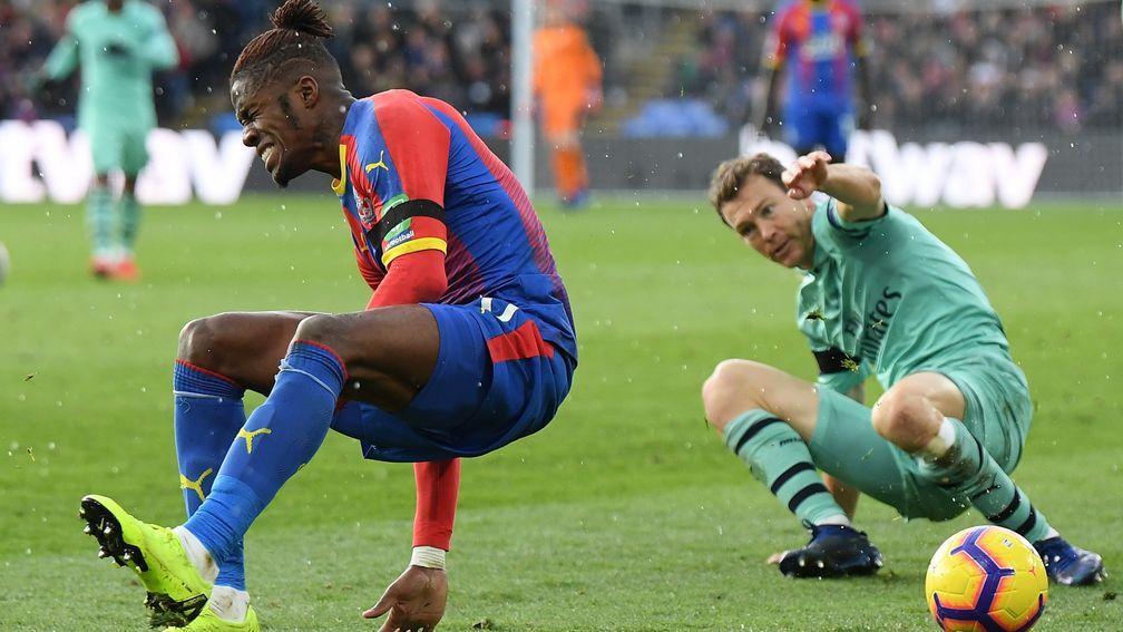 Wilfried Zaha came in for some rough treatment against Arsenal