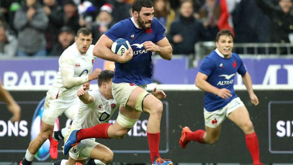 France captain Charles Ollivon breaks through to score his side's third try against England