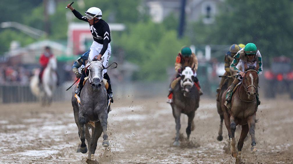 Jaime Torres celebrates after riding Seize the Grey to win the 149th running of the Preakness Stakes