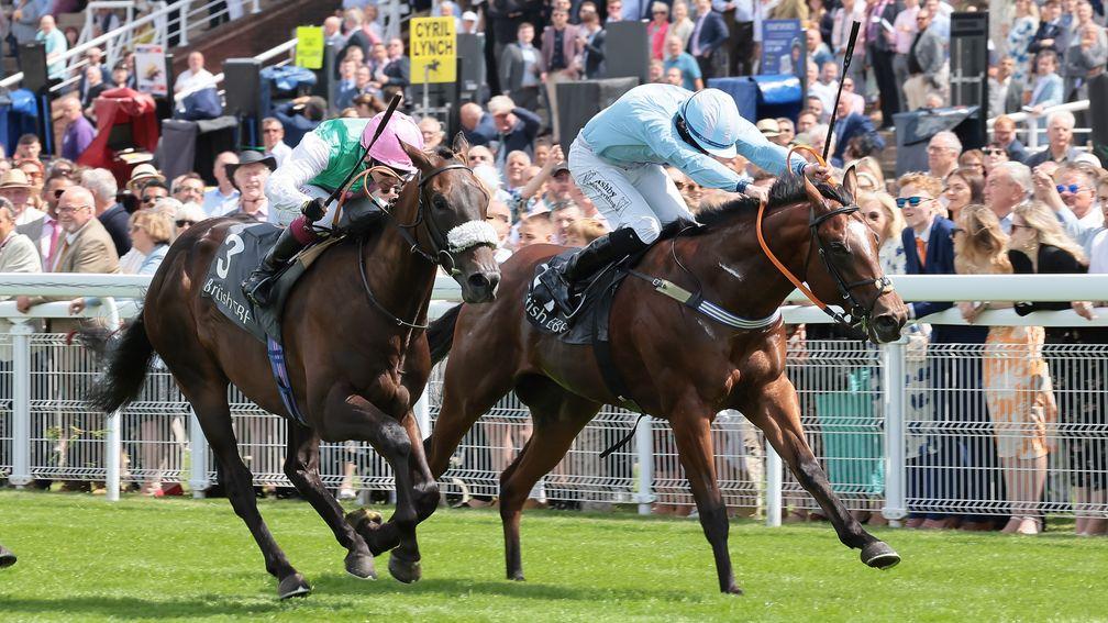 Mansa Musa (right) and Rossa Ryan win from Array at Goodwood