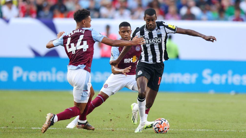 Alexander Isak (right) helped Newcastle qualify for the Champions League
