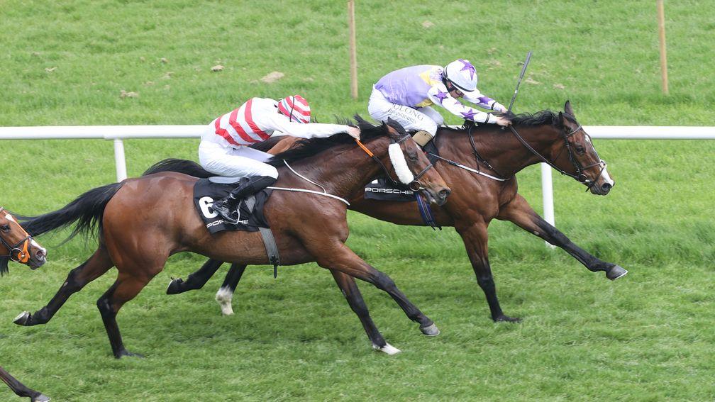 Leopardstown Sun 12 May 2024 Bold Discovery ridden by Shane Foley, winning The Porsche In Support Of Breat Cancer Ireland Amethyst Stakes from Real Appeal ridden by Ben Coen, 2nd, near side.