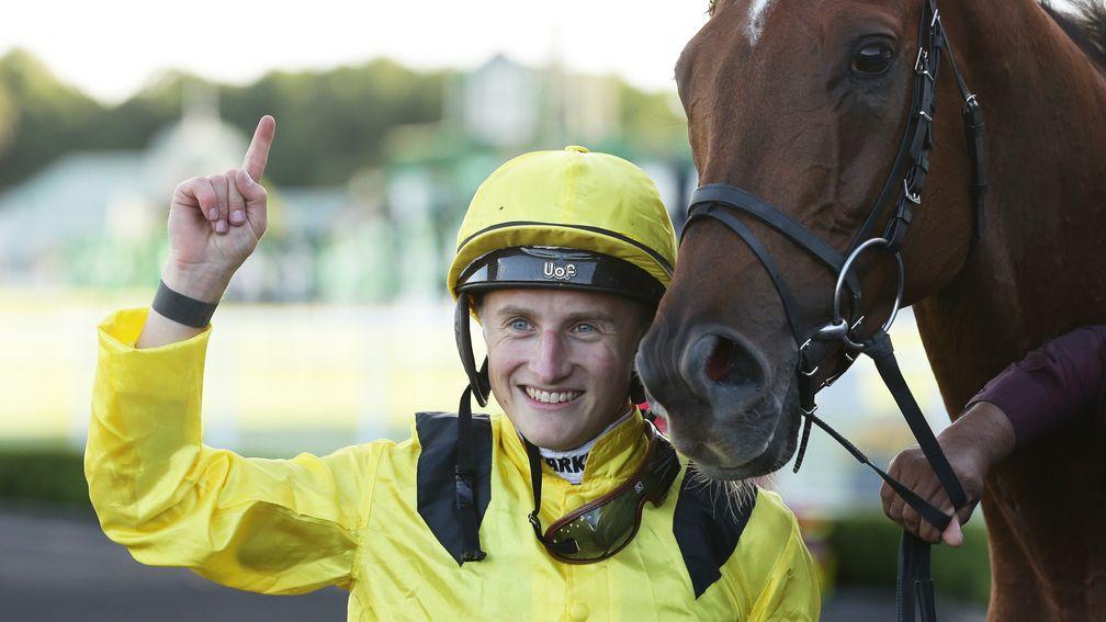 Tom Marquand celebrates after Addeybb's win in the Queen Elizabeth Stakes