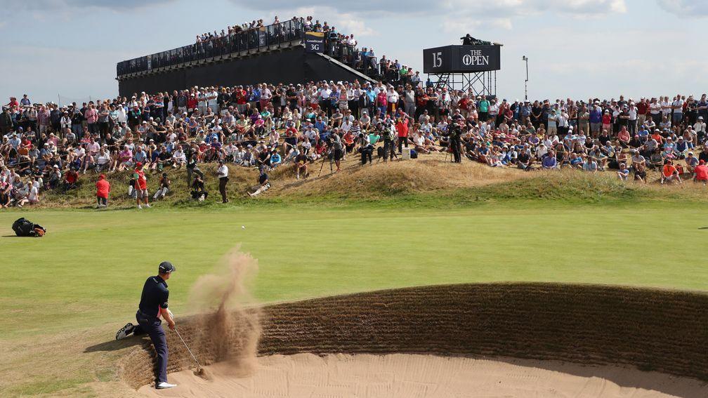 The galleries take in the first-round action on the 15th at Carnoustie