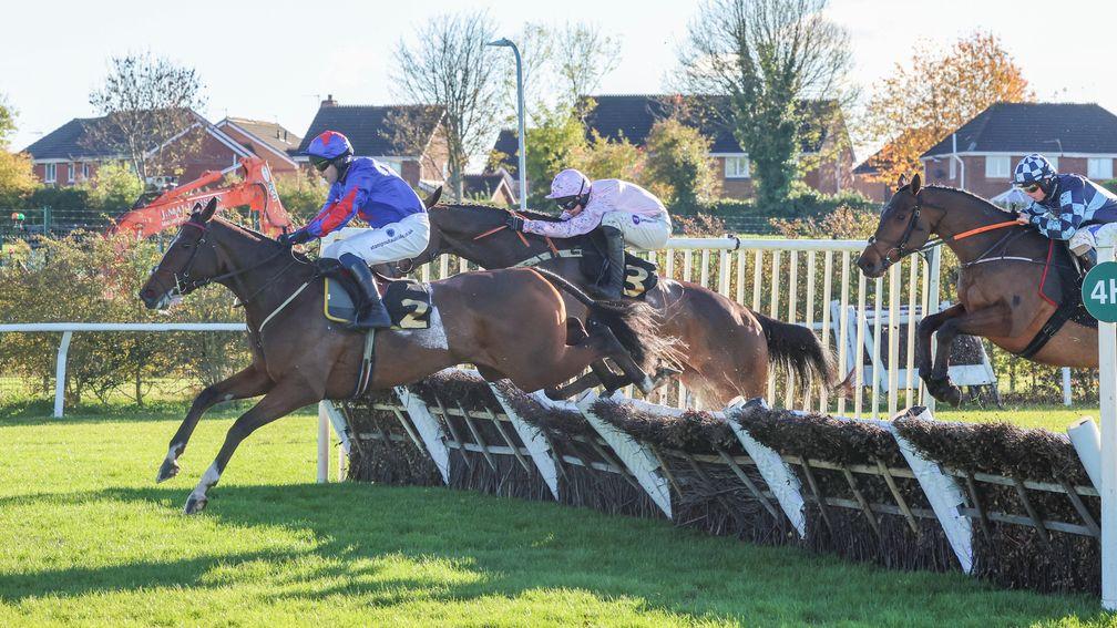 Josh The Boss: jumps one of the hurdles in use on the way to victory at Aintree