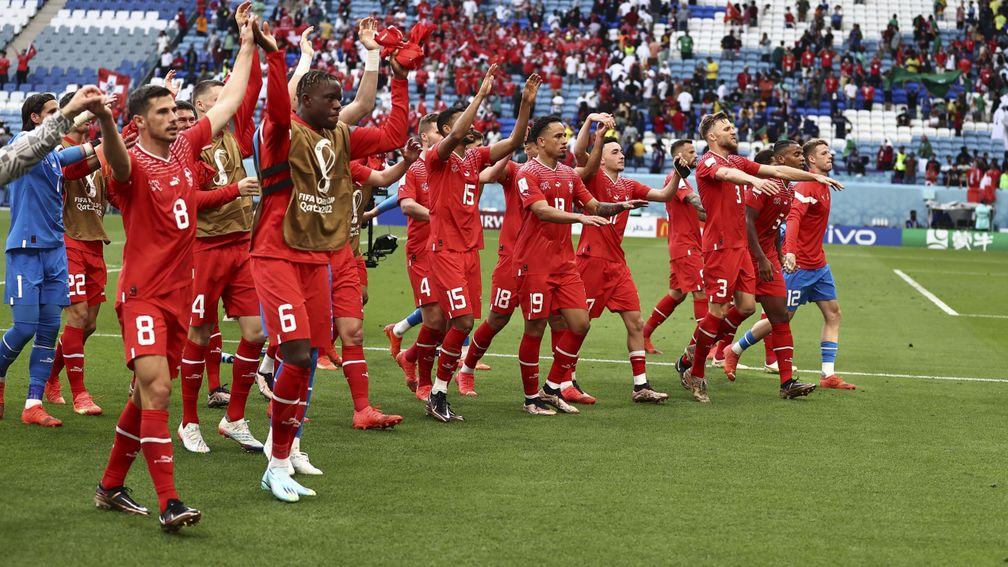 Switzerland celebrate their opening victory over Cameroon