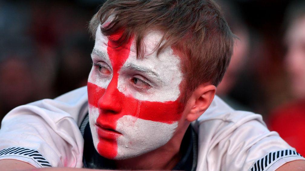 Football fans react as they watch England lose to Croatia