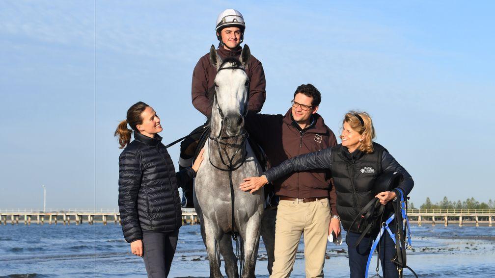 Trainer Matt Cumani poses with his Melbourne Cup runner Grey Lion,  sister Francesca (left), mother Sara and rider Bastion Neuhaus after a trackwork session at Altona Beach before the Melbourne Cup Carnival